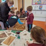 We had a very successful Science Open Morning for families on the 4th day of British Science Week. 
There was some fossil hunting in P1/2 while the P3-7 children modified the pulleys they made earlier in the week with the help of their visitors. 
The Young STEM Leaders then took over, each showing a group of children how the new STEM resources can be used. They showed great leadership skills, well done to them!
The morning was rounded off with some shelter building in P1-4 and a challenge to build the tallest earthquake - proof building using marshmallows, cocktail sticks and spaghetti for P5-7. 
We hope all our visitors enjoyed learning about  STEM activities in school.